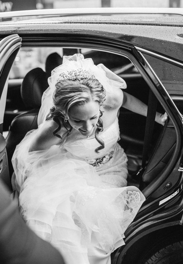 J&M bride getting out of car