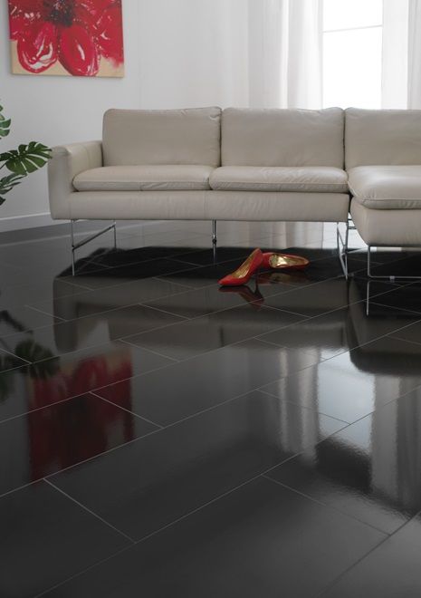 Glossy Black Flooring Makes For A Very Modern Look In The Living Glossy Black Flooring Makes For A Very