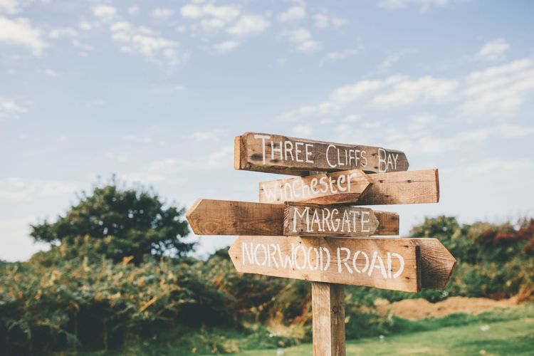 Bright Retro Vintage Wedding By The Sea Rustic Outdoor Bright Retro Vintage Wedding By The Sea Whimsical Wonderland Weddings Wooden Signswedding