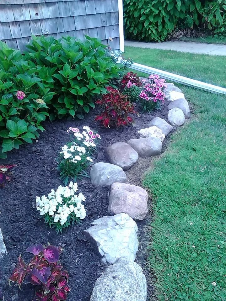Amy's flower bed in our front yard. She worked hard ... Amys flower bed in our front yard She worked hard