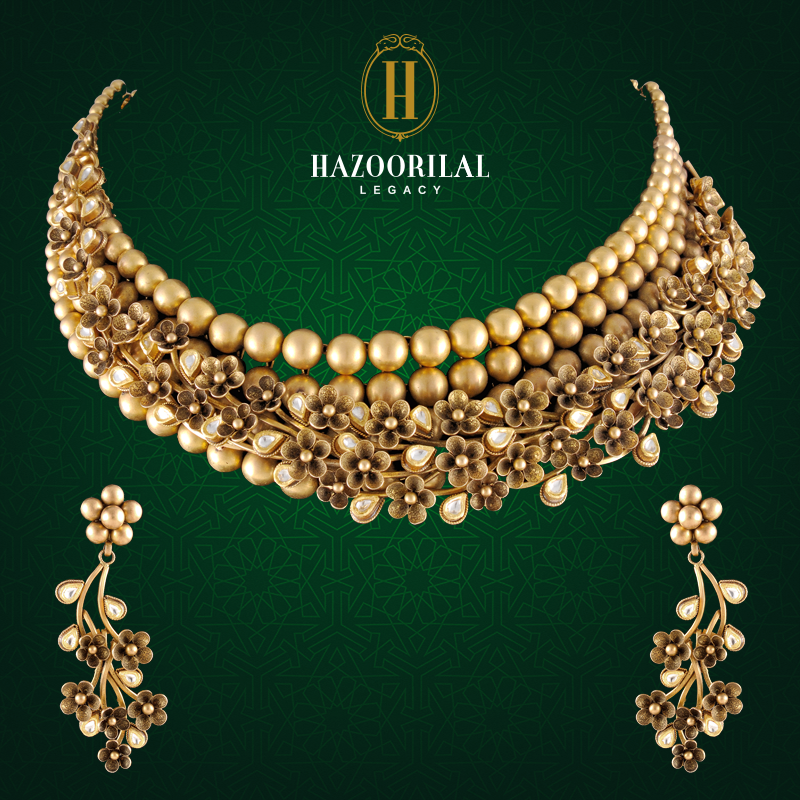 #TheGoldenEssence: Featuring an ethereal charm, stunning details define the floral gold necklace by #HazoorilalLegacy. Visit us for elegant designs at our exclusive showrooms in South Extension, New Delhi: 011 - 4873 3333 & Gold Souk, Gurgaon: 0124 - 4115123 Antique Necklace Gold, Antique Gold Jewelry Indian, Antique Bridal Jewelry, Gold Jewelry Simple Necklace, Gold Bride Jewelry, Silver Jewelry Gifts, Bridal Gold Jewellery, Gold Jewellery Design, Bridal Jewelry Sets