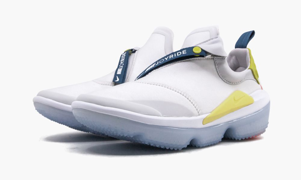 The Nike Joyride Optik Women's shoe is a comfort-oriented silhouette that offers a lot of style. The sleek silhouette is done primarily in white and light grey and then paired with fun color accents in citron, yellow, and forest green. The asymmetrical zip closure feels snug against the foot and bears the shoe's style name written in white font. The upper rests on an icy blue translucent rubber footbed. The Joyride Optik treats feet to a new world of cozy with a soft cushioning unit comprise Color Accents, Accent Colors, Nike Joyride, Asymmetrical Zip, Rests, Icy, Forest Green, Black Shoes, Nike Women