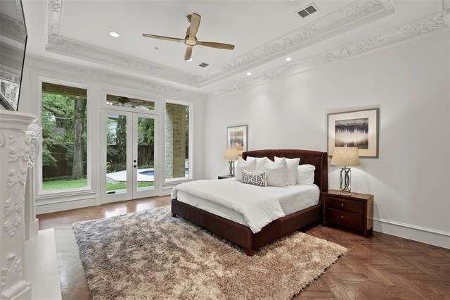 This luxury mansion is extraordinary with a stucco exterior, gable roofing, curved bay windows, and stunning two-story covered entry where warming coach lights add quiet beams that say welcome home. The front looks European, but as you approach the rear, the exterior exudes a contemporary style. Interior ornate designs on large decorative columns, dramatic fireplaces and crown molding are some of the amenities. Entry through the two-story covered entry into the grand foyer offers an open feel th Elegant Dining Room, Elegant Bedroom, Formal Dining Room, Mansions Luxury, Mansions Homes, Luxury Homes, Contemporary House Plans, Modern House, Contemporary Style