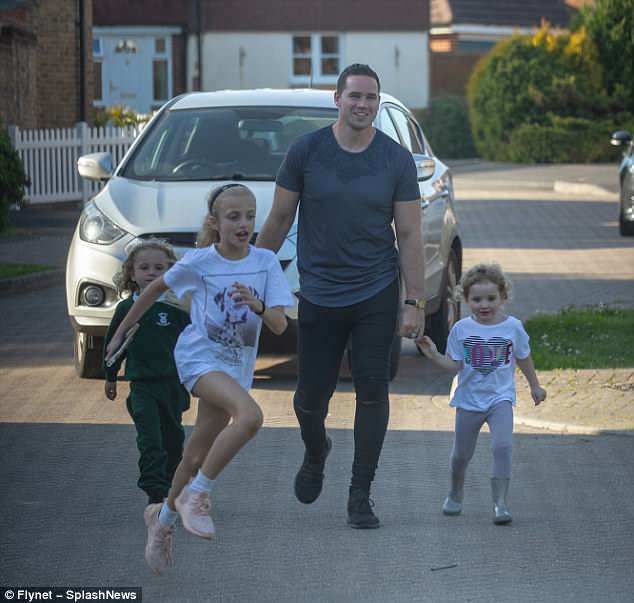 Kieran Hayler is left on babysitting duties after Katie Price jets