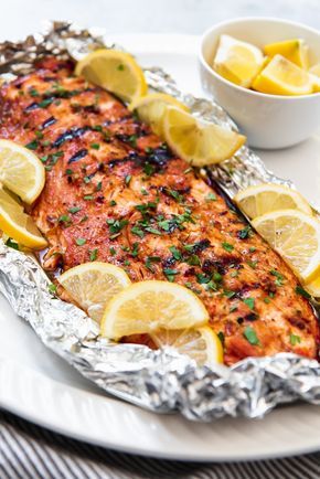 An image of grilled salmon made with a garlic soy brown sugar marinade, then wrapped in foil to go on the grill. Bbq Salmon Recipes, Easy Grilling Recipes, Grilled Salmon Recipes, Cooking Recipes, Healthy Recipes, Grilled Shrimp, Grilled Cheese, Tilapia Recipes, Salmon Grilled In Foil