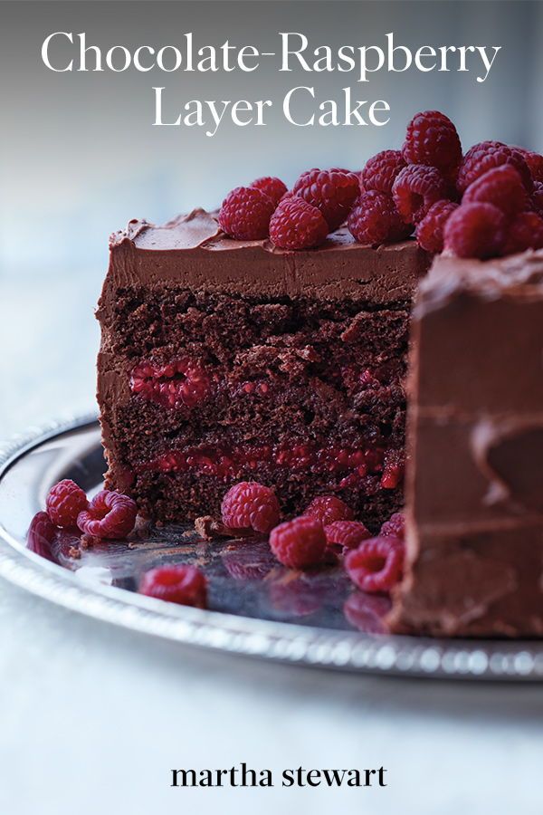 Chocolate-Raspberry Cake | This beauty is baked with a splash of Chambord and layered with a sweet raspberry filling, both of which offer bright counterpoints to the thick layer of chocolate-cream cheese frosting and whole berries scattered on top. #food #recipe #marthastewart #valentinesdayrecipes #desserts Raspberry Cake Recipes, Chocolate Raspberry Cake, Vegan Chocolate, Chocolate Desserts, Chocolate Cream, Chocolate Frosting, Cake Chocolate, Unsweetened Chocolate, Decadent Chocolate