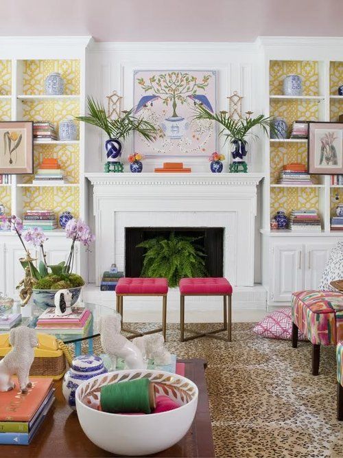 The Pink Clutch Palm Beach Chic Living Room With Bold Colors Pops The Pink Clutch Palm Beach Chic Living Room With Bold Colors Pops Of Bookcases Wallpaper Leopard Rug And Blue White