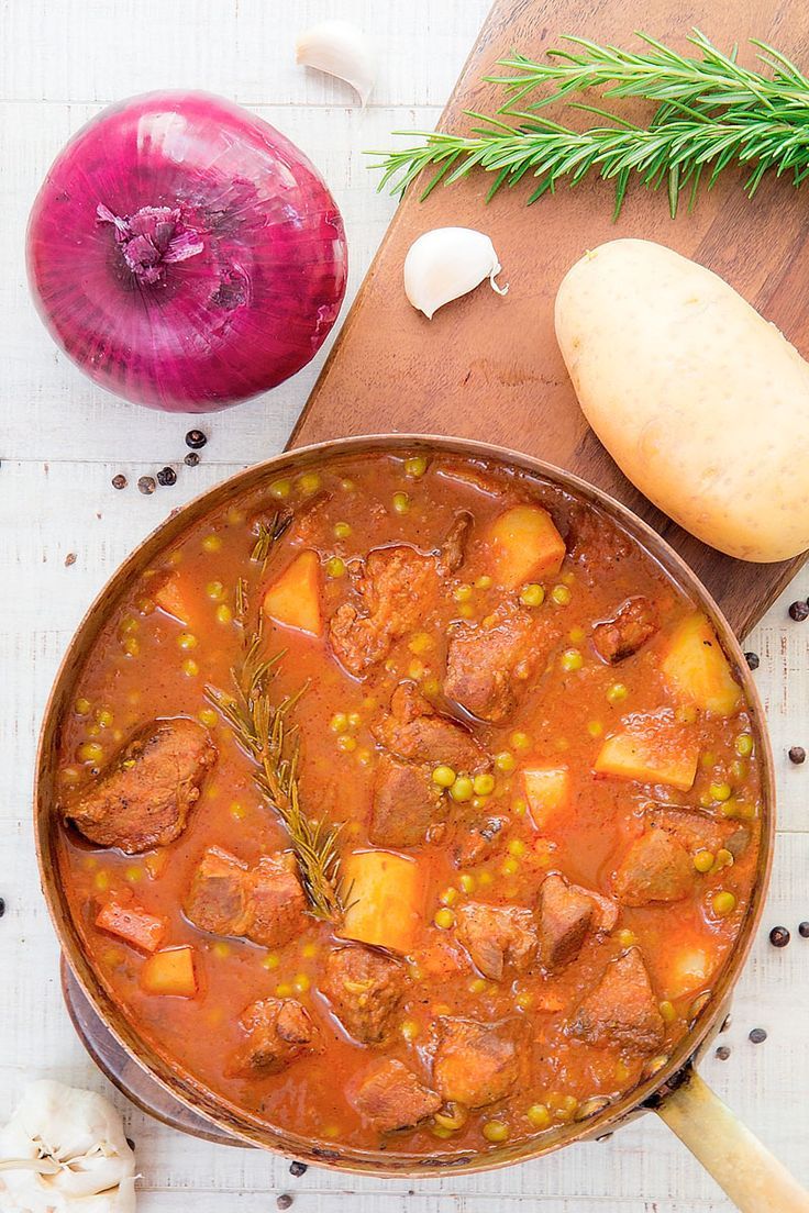 ITALIAN PORK SHOULDER STEW with potatoes and peas ITALIAN PORK SHOULDER STEW with potatoes and peas