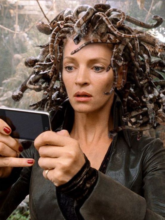 I kept my eyes closed tight. "Get off them!" I shouted at Medusa. The