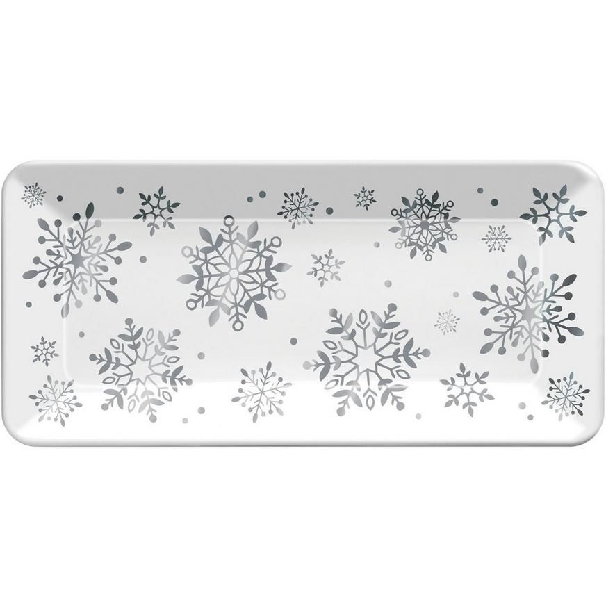 Celebrate the holidays with delicious snacks served on a plastic platter! The BPA-free melamine tray is white with metallic silver snowflakes. The sturdy construction won't flex or bend and you can reuse it year after year. Metallic Silver Snowflake Melamine Rectangular Platter product details: 8in wide x 17in long BPA-free melamine plastic Hand wash only Not suitable for microwave or dishwasher use Holiday Christmas Party, Christmas Party Supplies, Christmas Tree With Gifts, Holiday Treats, Christmas Themes, Christmas Holidays, Silver Snowflakes, Theme Noel, Ballon Helium