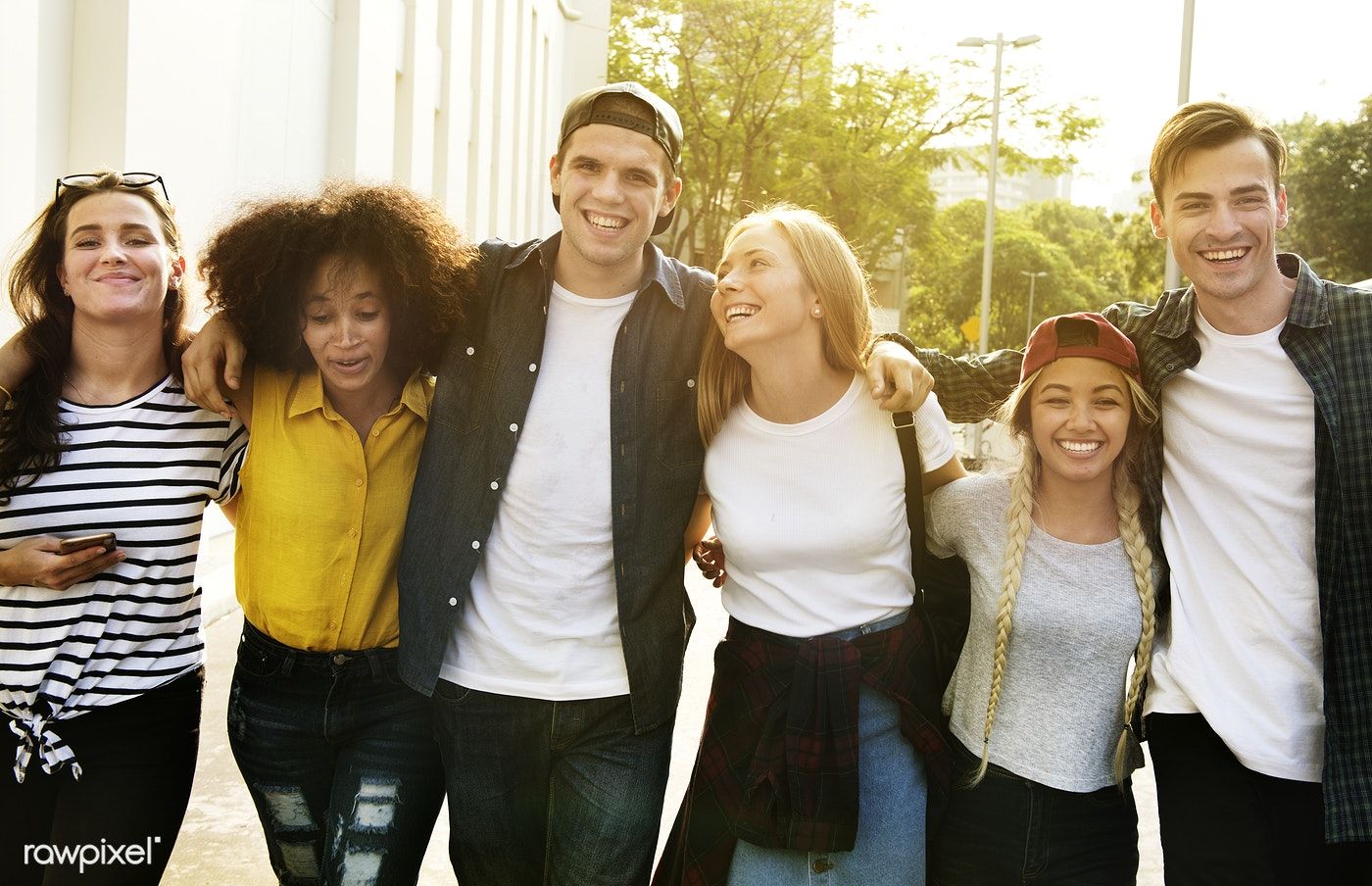 Download Premium Photo Of Smiling Happy Young Adult Friends Arms