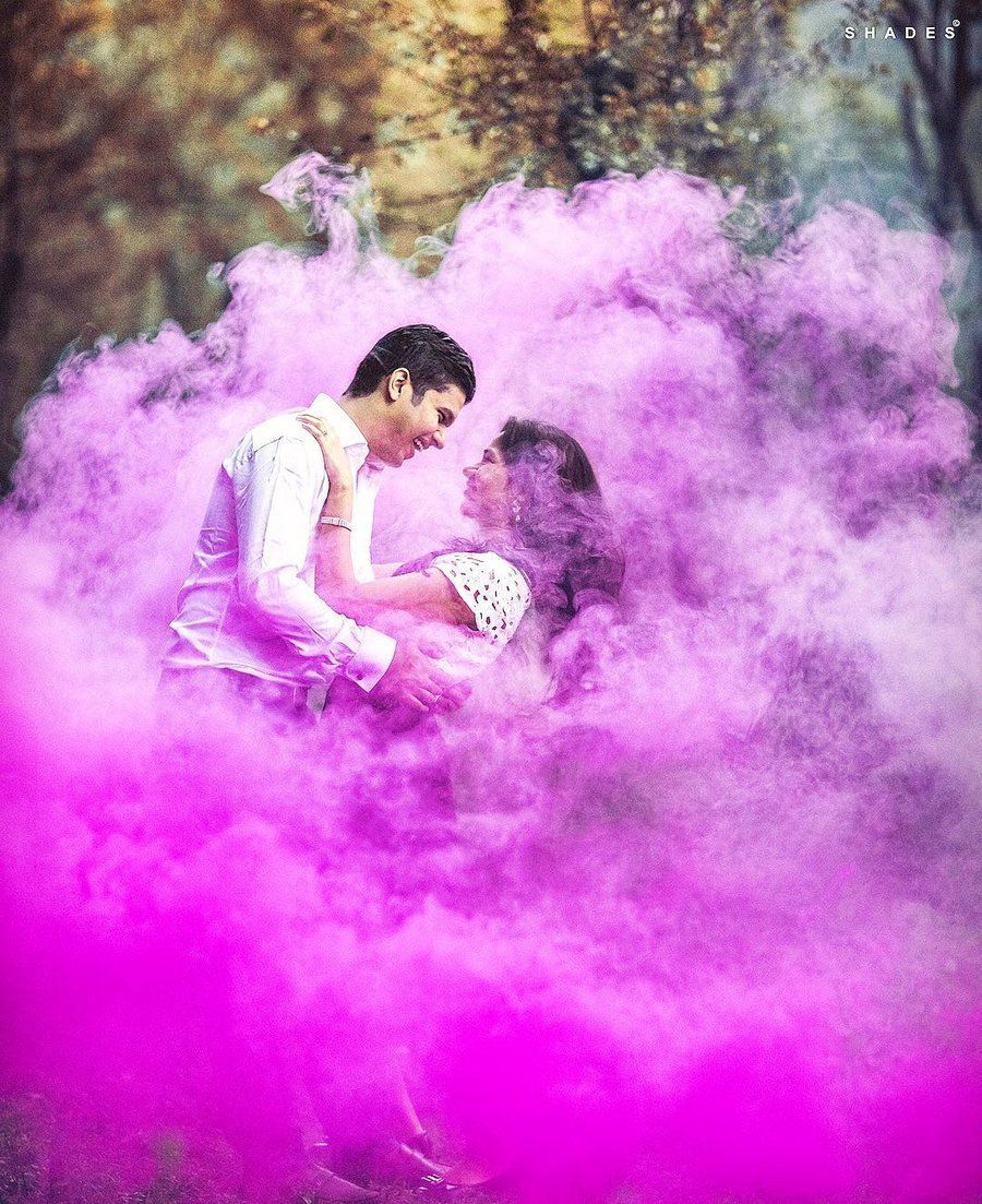 Fun Ways to use Smoke Bombs in your Wedding + Happy & Colourful Photo Ideas! | ShaadiSaga Indian Wedding Couple Photography, Wedding Couple Poses Photography, Wedding Photography Poses, Photography Trends, Film Photography, Gender Reveal Photography, Pre Wedding Shoot Ideas, Pre Wedding Poses, Pre Wedding Photoshoot