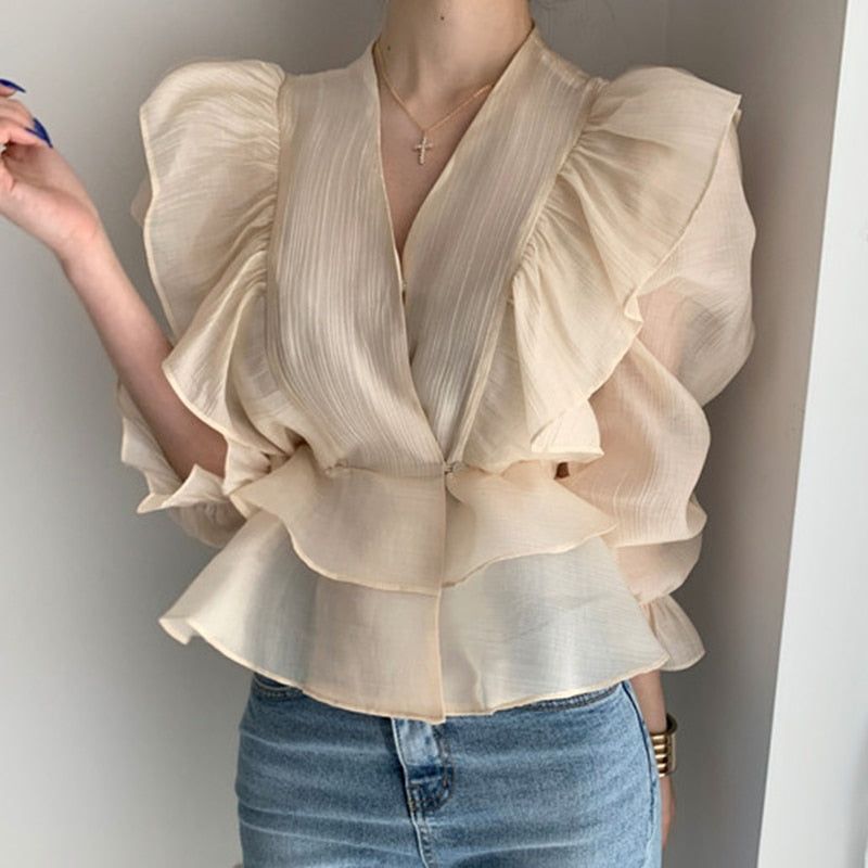SPECIFICATIONSYear Season: 2020 AutumnStyle: Office LadySleeve Style: Puff SleeveSleeve Length(cm): halfSize: One SizePattern Type: SolidMaterial: PolyesterMaterial: AcetateMaterial: SpandexFabric Type: ChiffonDecoration: RUFFLESColor Classification: ApricotCollar: V-NeckClothing Length: ShortBrand Name: MagesuekAge: Ages 18-35 Years Old Trendy Fashion, Korean Fashion, Girl Fashion, Fashion Dresses, Vintage Fashion, Fashion Design, Style Vintage, Fashion Trends, Classy Outfits