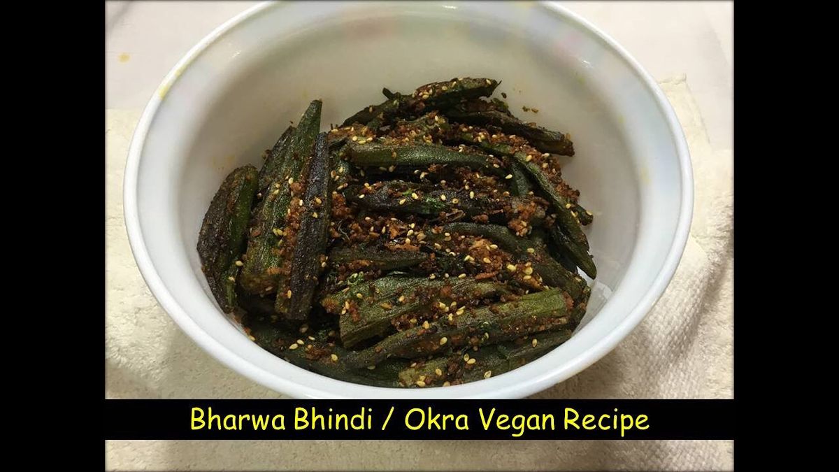 This is a popular indian side dish, where okra or bhindi is stuffed with spice powders of coriander, cumin, kashmiri red chillies, kitchen king or garam masala and dessicated coconut. Prepared in mustard oil, this brings out a special characteristic flavour. This vegan dish is a must try lip smacking recipe. #veganokrarecipe #bharwabhindi #stuffedokrarecipe Vegan Okra Recipes, Indian Side Dishes, Mustard Oil, Garam Masala, Vegan Dishes, Coriander, Chilli, Green Beans, Spices