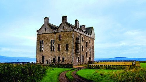 situated just a third of a mile to the north of dalmeny house on the shores of the firth of forth barnbougle scotland castles foreign travel scottish castles