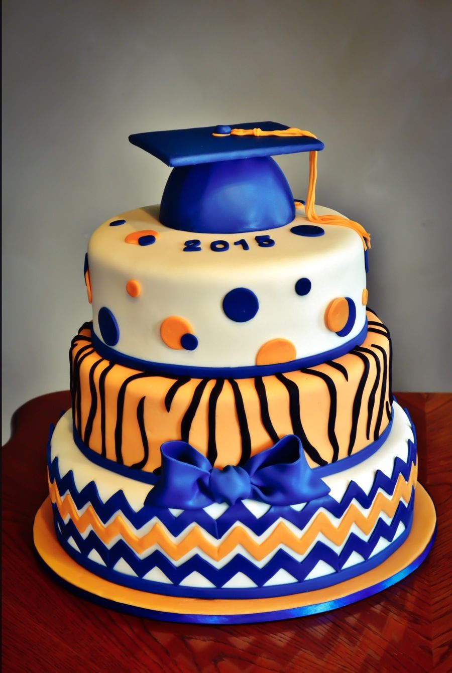 Orange and Blue Graduation Cake....or gold and blue looks like MPHS Мини Пи...