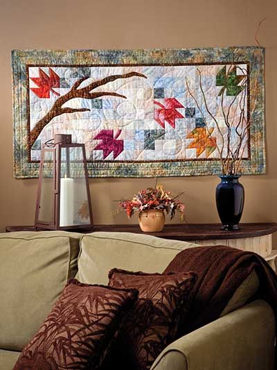 Blowin' in the Wind Quilt Pattern Download from e-PatternsCentral.com -- The windblown leaves in this pieced and appliqued wall quilt will add a lively touch of autumn to your decor. Holiday Quilts, Fall Quilts, Small Quilt Projects, Quilting Projects, Mini Quilts, Patchwork Quilts, Wall Quilt Patterns, Quilting Patterns, Machine Quilting Pattern