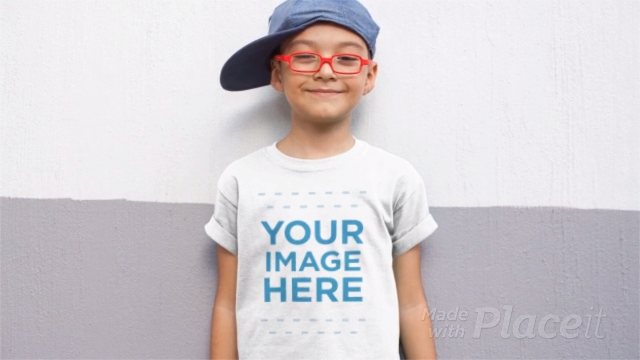 Download Kid Wearing A Hat And A T Shirt Mockup Video Kids Wear T Shirt Diy Shirt Mockup