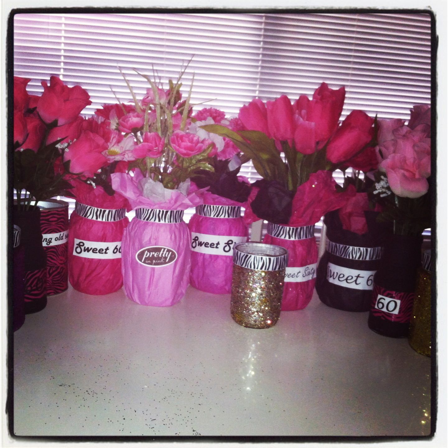 Centerpieces for moms sweet 60th birthday party Tissue wrapped