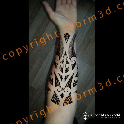 forearm tattoo with feathers