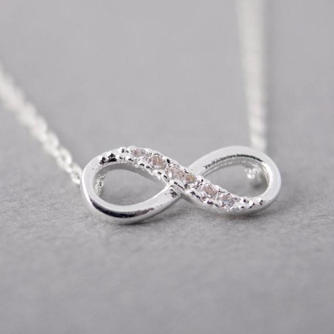 It refers to a new, happy and everlasting life. Get this Tiny Infinity Crystal Pendant Necklace to remind you of your main life purpose. Metals Type: Zinc Alloy Material: Metal Function: Mood tracker Get 50% OFF this trendy Tiny Infinity Crystal Pendant Necklace today!Just click the “Add to Cart” button above! We have very limited stock; they will go soon!Note: Please allow 2-4 weeks for delivery. Infinity Necklace Silver, Infinity Pendant, Long Chain Necklace, Long Pendant Necklace, Necklace Types, Crystal Necklace, Infinity Symbol, Diamond Necklaces, Silver Necklace