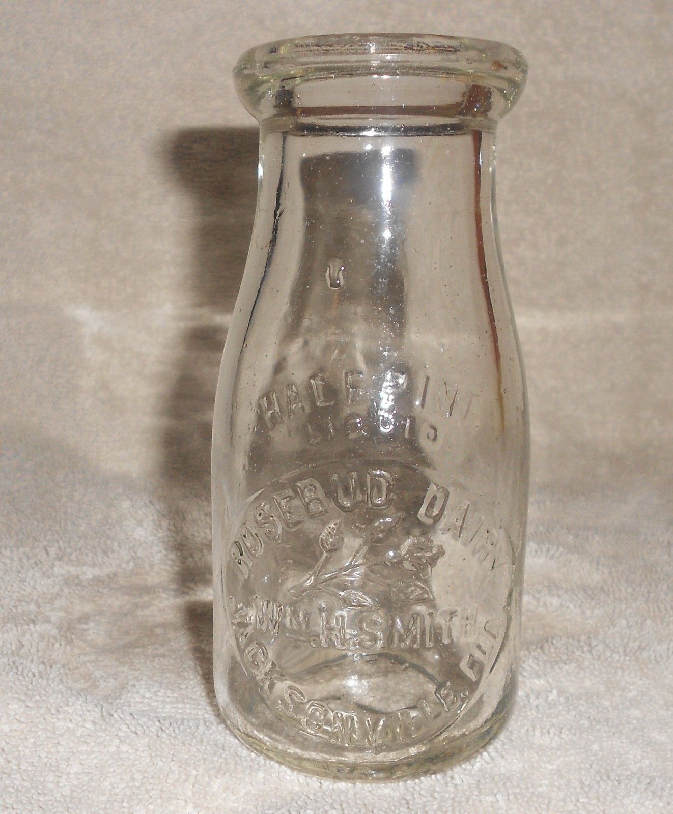 Half Pint Milk Bottle ROSEBUD DAIRY JACKSONVILLE FLA WM SMITH Half Pint Milk Bottle ROSEBUD DAIRY JACKSONVILLE FLA WM SMITH