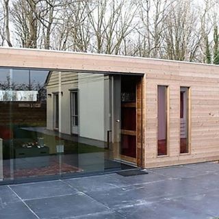 Nice design with a great wood cladding. #shippingcontainerhouse #containerhome #containerhomes Outdoor Swimming Pool, Swimming Pools, Modern Garden, Home And Garden, Sloped Garden, Wood Cladding, Minis, Small Pools, Outside Living