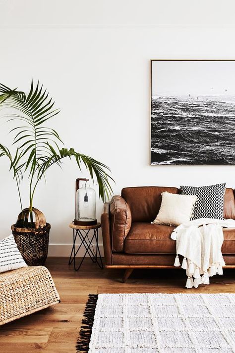 A soft leather couch, wool rug, chunky throw and touches of timber add warmth and texture to this living room. Leather Couches Living Room, Tan Leather Sofas, Living Room Furniture, Soft Leather, Brown Leather, Living Rooms, Living Room Apartment, Tan Couch Living Room, Sofa Furniture