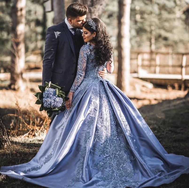 silver ball gown with sleeves