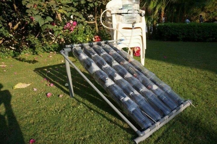 Home solar hot water heater from Coke bottles | Solar power diy, Solar