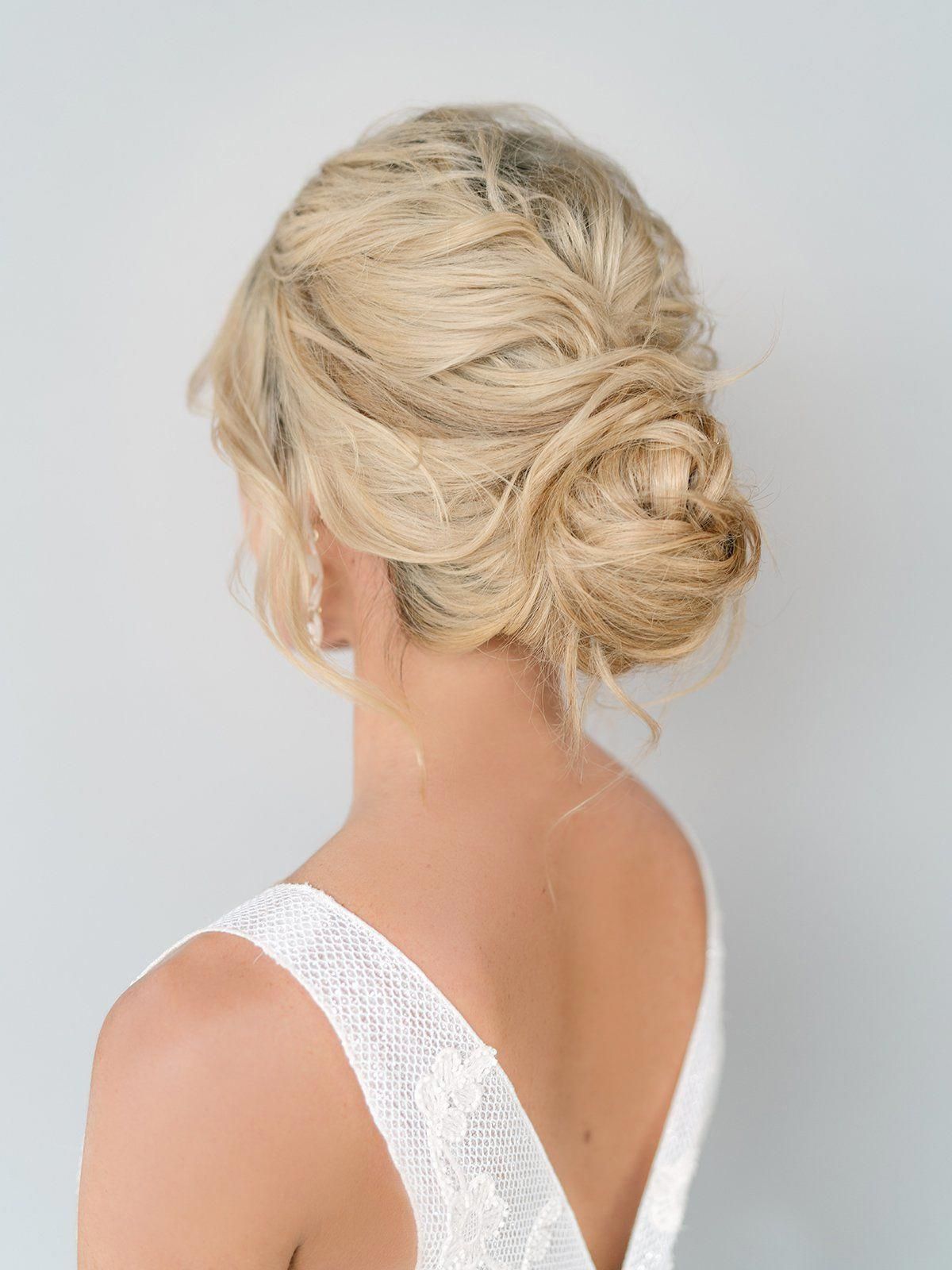 Loose, Braided Bun - Bridal Updo / Wedding Hairstyles - Beach Wedding Fashion // Venue: Balmoral Crystal Clear Lagoon | Photo: Stephania Campos | Videography: Meant To Be Films | Ceremony & Reception Dresses, Veil: Belle Âme Bridal | Makeup & Hair: Adorne Artistry // #weddinghair #bridal #updo #bun #hairstyle #fashion #weddinglook #bridalhair #hairstyles #bride #weddingtheme #blondehair #2020 #trending #hairupdos # loose Braids makeup #loosebraids