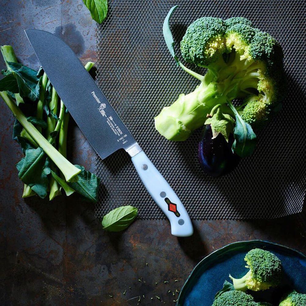 F Dick Premier WORLDCHEFS Santoku Knife 18cm The name Santoku is translated to ‘three virtues’ symbolises the characteristics of this knife – chopping, dicing and mincing. A great all-purpose knife. Compared to the Chef knife they are typically smaller, thinner and lighter, may be more comfortable for people with smaller hands and allows you to chop food with ease. Features Forged knives with bolster and integrated tang non-slip. Has a unique composition of a hygienic non-sticking coating and a Chefs, Magnetic Knife Rack, Forged Knife, Santoku Knife, Bread Knife, Paring Knife, Professional Chef, Le Chef, Utility Knife