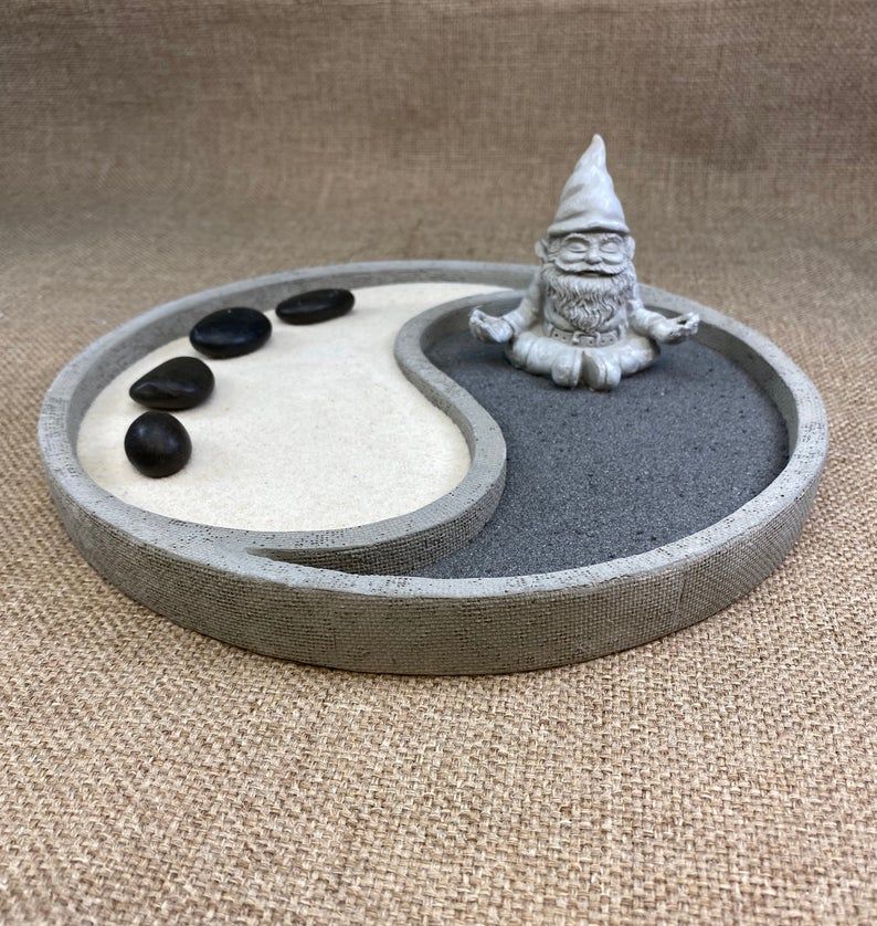 This cement round Yin Yang zen plate is perfect for creating zen or miniature gardens. #fairygarden #fairygardenminiatures #fairygardendecor #makeafairygarden #fairies #makeaminiaturegarden #zengardening #zenfairygarden #japanesezengarden #miniaturezengarden #fairygarden #fairygardenminiatures #miniaturesupplies #miniaturegardening #fairyaccessories #fairygardensupplies #fairygardenfurniture #onlyinminiature Winter Fairy Garden, Christmas Fairy Garden, Spring Fairy, Zen Sand Garden, Mini Zen Garden, Diy Garden, Japanese Sand Garden, Garden Ideas, Yin Yang