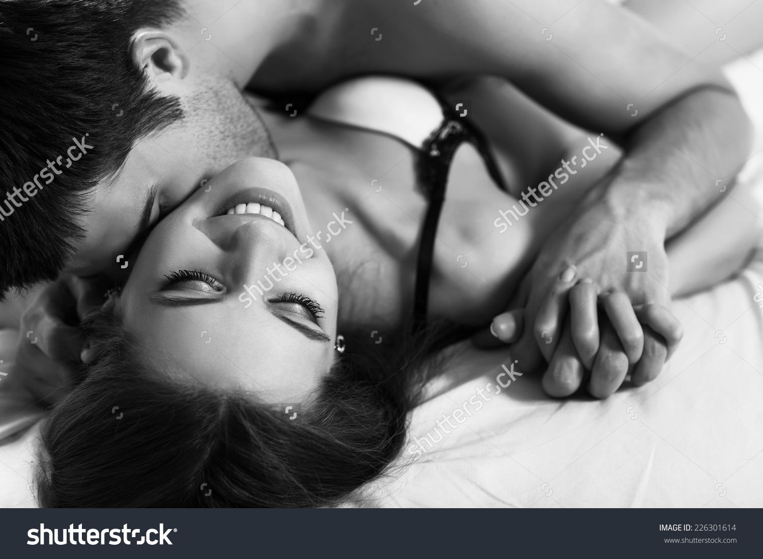Young Passionate Couple Making Love In Bed Young Passionate Couple Making Love In Bed