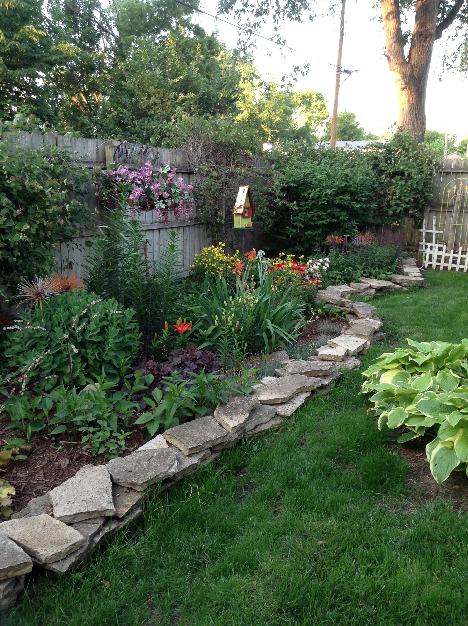 back yard - love the rock wall border | Garden yard ideas ... back yard - love the rock wall border | Garden yard ideas ... on Back Wall Garden Ideas id=37931