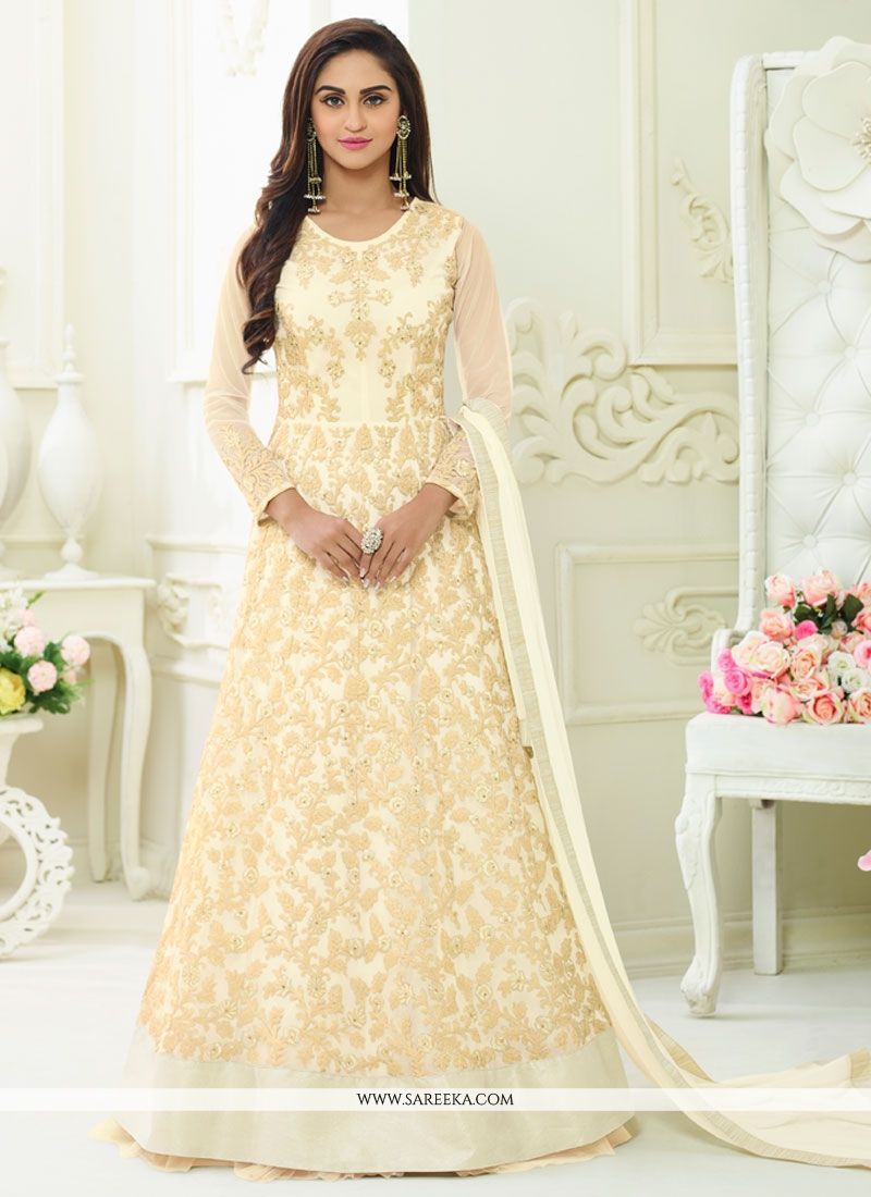 Real magnificence can come out from your dressing trend with this cream net floor length anarkali suit. The incredible dress creates a dramatic canvas with wonderful embroidered and resham work. Comes... Bollywood Dress, Bollywood Fashion, Indian Gowns, Indian Outfits, Latest Anarkali Suits, Western Dresses Online, Floor Length Anarkali, Designer Anarkali Dresses