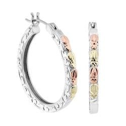 Sterling Silver Hoop Earrings with 14k white gold posts with camel backing. Petite Hand-Engraved, Hand-Placed, Satin Finished 12k Green Gold Grape Leaves and 12k Rose Gold Grape Leaves. Designed just for you in South Dakota, USA. Earrings Measure 0.9" inch X 0.9" inches. Usually requires 15 business days to manufacture. Certificate of Authenticity and Manufacturer’s Lifetime Warranty against Defects in Materials and Workmanship Included. Authentic Black Hills Gold Jewelry get brighter and pretti Sterling Silver Hoop Earrings, 925 Sterling Silver, Silver Gold, White Gold, Rose Gold, Black Hills Gold Jewelry, Traditional Earrings, Cz Diamond, Leaf Earrings
