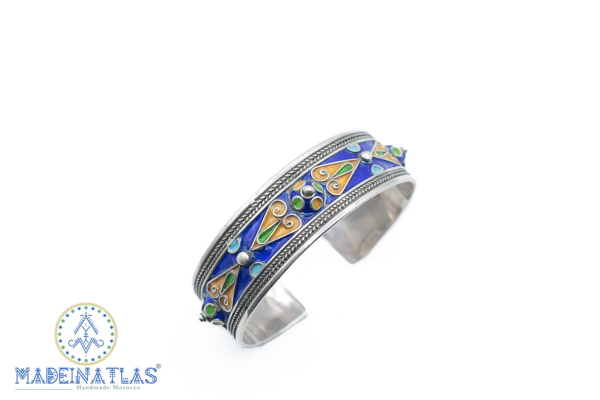 Magnificent Berber silver bracelet adorned with engravings and colorful patterns then ornated with blue, green and yellow enamel, to bring you class and originality. With ethnic patterns specific of Berber Jewelry, this bracelet is very chic, hand-crafted, you could wear it with all day or evening outfits, it's perfect for an everyday look or a more dressed-up outfit. Are you looking for a unique and exotic jewelry? What about Moroccan jewelry?! Wear this silver bracelet for a bohemian addition Silver Engraved Bracelet, Enamel Bracelet, Silver Anniversary, Anniversary Christmas, Moroccan Jewelry, Boho Jewelry, Tribal Bracelets, Cuff Bracelets, Ethnic Patterns