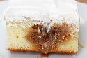 This Cinnamon Roll Poke Cake Is So Delicious It's Going To Make You Smile #cinnamonrollpokecake