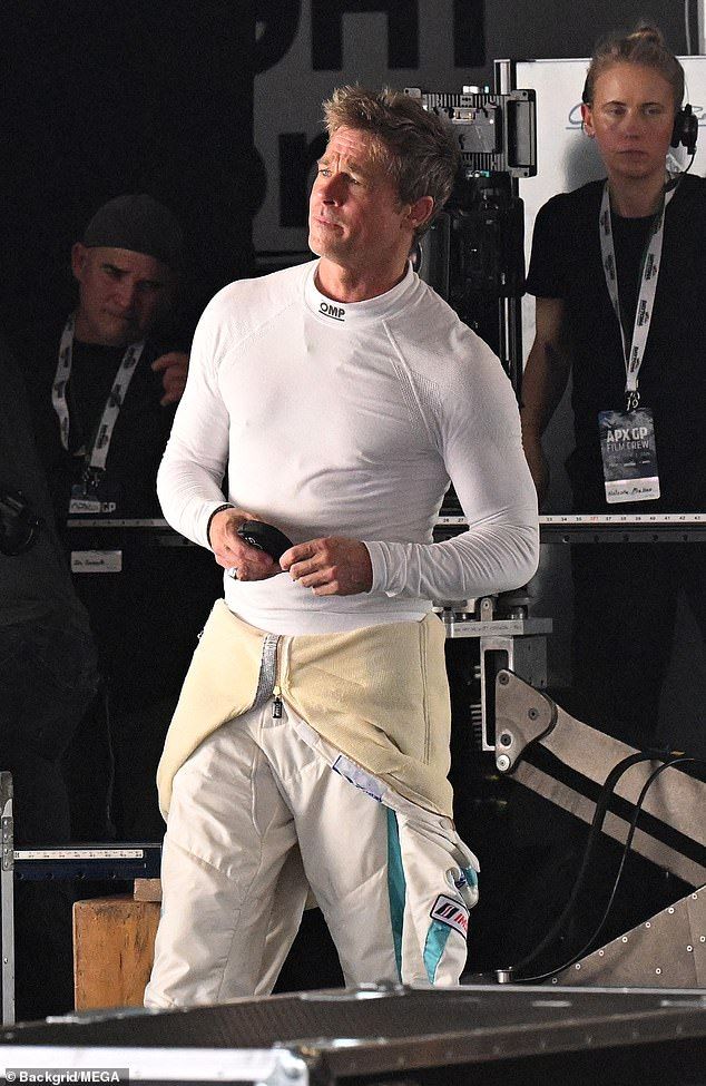 Brad Pitt, 60, shows off his stunning buff physique filming F1 movie