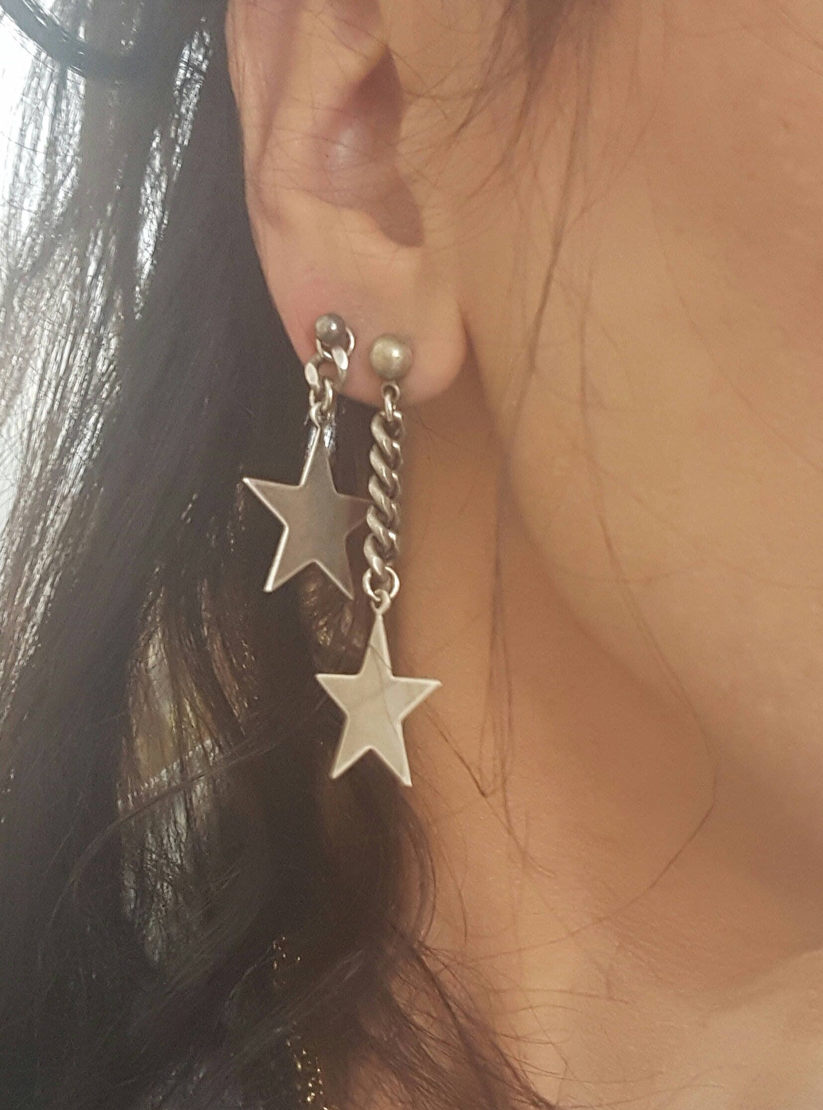 "♦ Beautiful earrings, made of silver-plated brass in very high quality, with a Stars pendants. The earrings come in a tree pic two long one short. SIZE LONG: long earrings 1.95\"(5cm) and the shorter 1.18\"(3cm) ♦ This piece of jewelry is perfect as a gift for yourself, for a wedding day, Valentine's day or a birthday. If you're interested in sending a gift to a third party, just write your message to the recipient and I will do so with joy. YOU CAN SEE MORE STAR EARRINGS IN THE LINK: https://e Dope Jewelry, Funky Jewelry, Dream Jewelry, Pretty Jewellery, Star Jewelry, Silver Jewelry, Silver Star Earrings, Long Chain Earrings, Chunky Earrings