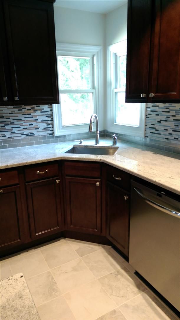 This Kitchen In Teaneck Nj Was Gutted Down To The Studs Two New Windows Were Installed And Major Repairs Were Made T Kitchen Renovation Wood Cabinets Kitchen