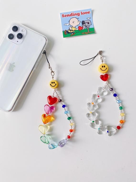 Long Bead phone charm keychain.✔️The phone case is not a set.2 ColorㅡㅡㅡㅡㅡㅡㅡㅡㅡRainbow colorClear colorㅡㅡㅡㅡㅡㅡㅡㅡㅡ📦 Shipping takes 2weeks.(We are not responsible for the loss.) Beaded Jewels, Beaded Jewelry Diy, Beaded Rings, Diy Beads, Handmade Jewelry, Preppy Jewelry, Girly Jewelry, Cute Jewelry, Jewelry Shop