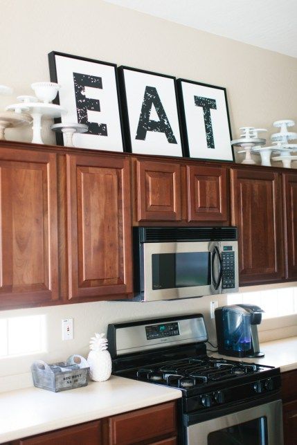 Discover 10 New Ways To Decorate Above Your Kitchen Cabinets Decorate On Top Of Kitchen Cabinets Above Cabinet Decor Decorating