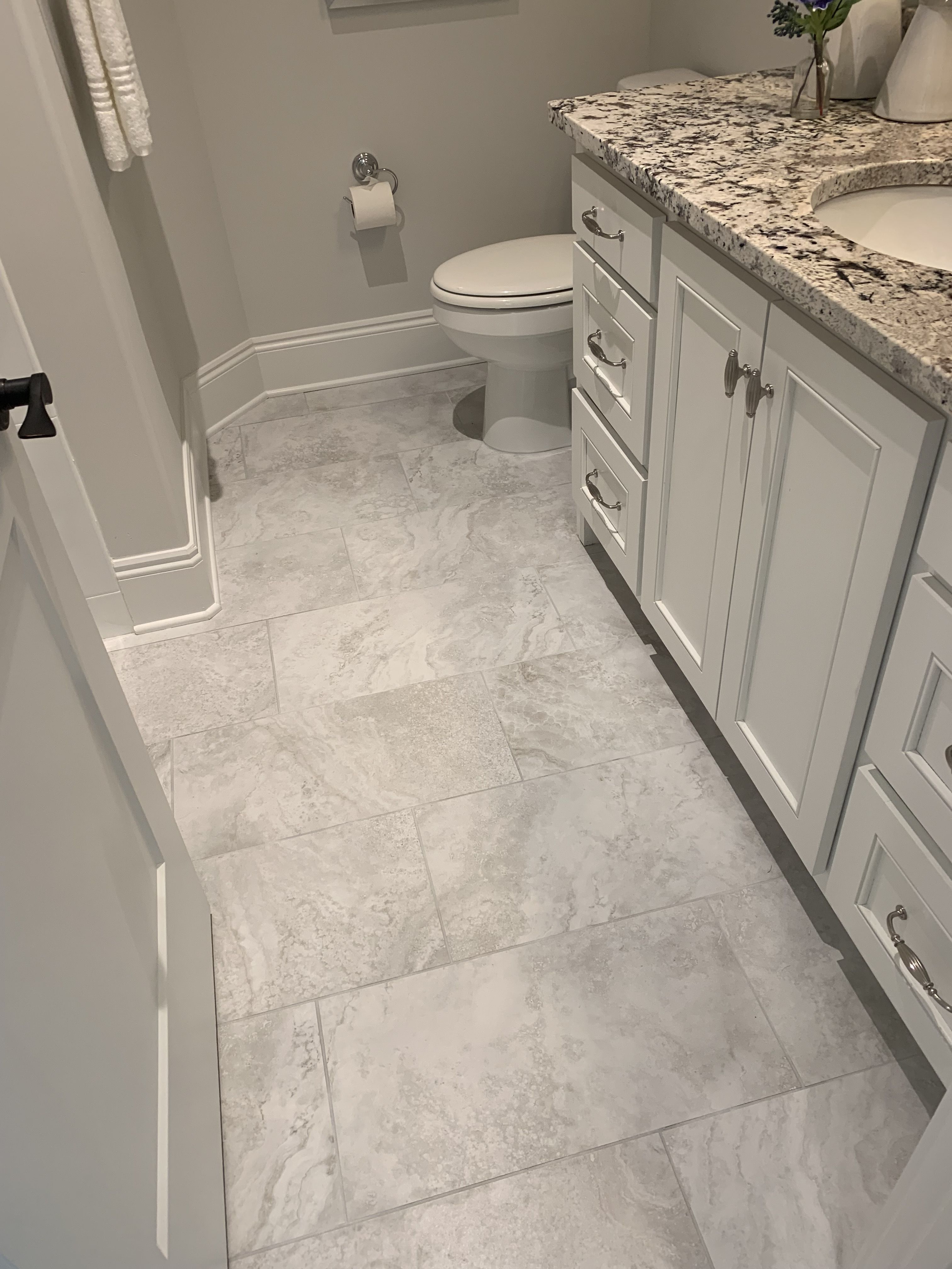 Master Bathroom with Beautiful Flooring