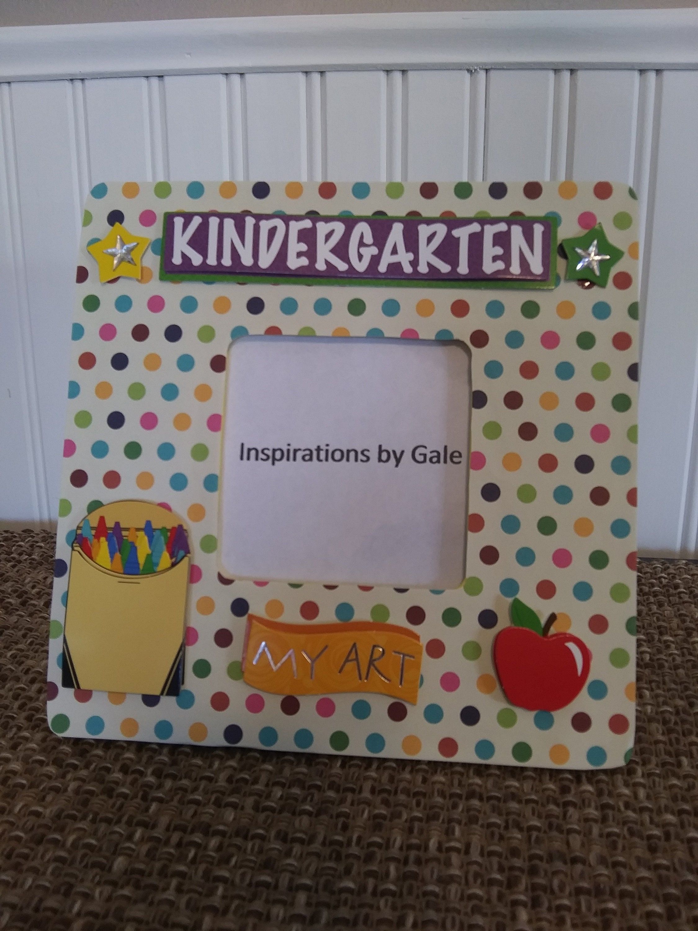 "Handmade Dimensions- frame- 8\"x8\" picture size- 3.5\"x3.5\" Material- wood frame, paint, sealant, plastic insert, hardware, scrape book paper and paper embellishments. This adorable frame is made of wood, and painted on the backside is yellow. On the front is paper with paper embellishments featuring school décor. The frame has a plastic insert to protect the picture. There is hardware on the back to hang on a wall. It also has a peg on the back to sit on a table or mantel. Welcome to my shop Paint Sealant, School Decorations, Made Of Wood, Picture Sizes, A Table, Embellishments, Mantel, Picture Frames, Wood Frame