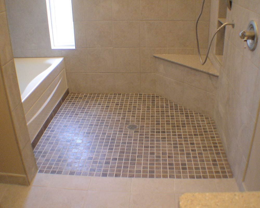 Accessible showers handicap accessible custom tile shower and tub with built in shelves bathroomconstruction