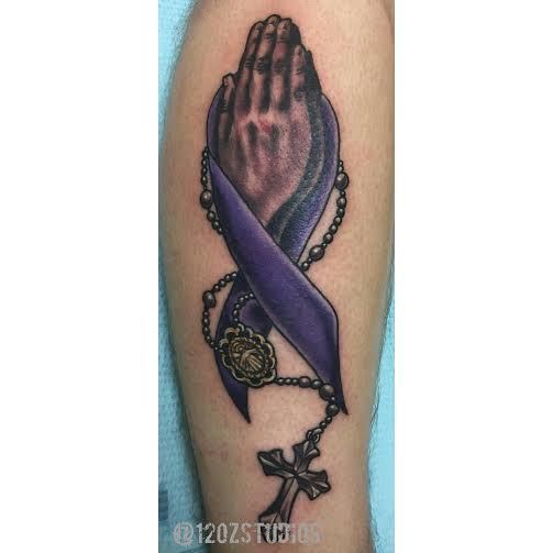 Lovely praying hands purple ribbon pendant rosary beads cross tattoo by Jose Bolorin. #rosarybeadtattoo Lovely praying hands purple ribbon pendant rosary beads cross tattoo by Jose Bolorin. #rosarybeadtattoo