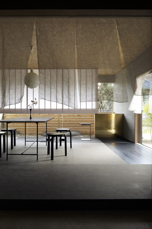 an old japanese house has been transformed into a landscape