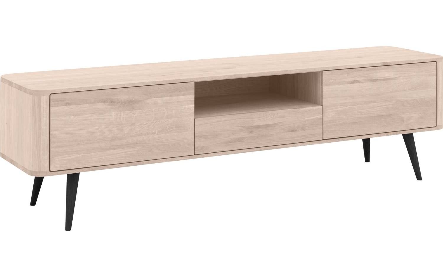 Tv-meubel Bjarte is dankzij het trendy design een aangename toevoeging aan jouw zithoek. De ronde, wijd uitlopende poten geven Bjarte een retro look. Het tv-meubel is gemaakt van duurzaam eikenhout, hierdoor heeft hij een lange levensduur en door de nerftekeningen en kleurschakeringen krijgt het meubel een natuurlijke en pure uitstraling. Het tv-meubel heeft 1 la en 2 deuren welke voorzien zijn van een soft closing systeem. Zo heb je voldoende ruimte om al jouw spullen netjes op te bergen. Daarn Credenza, Cabinet, Storage, Furniture, Home Decor, Products, Clothes Stand, Purse Storage, Decoration Home